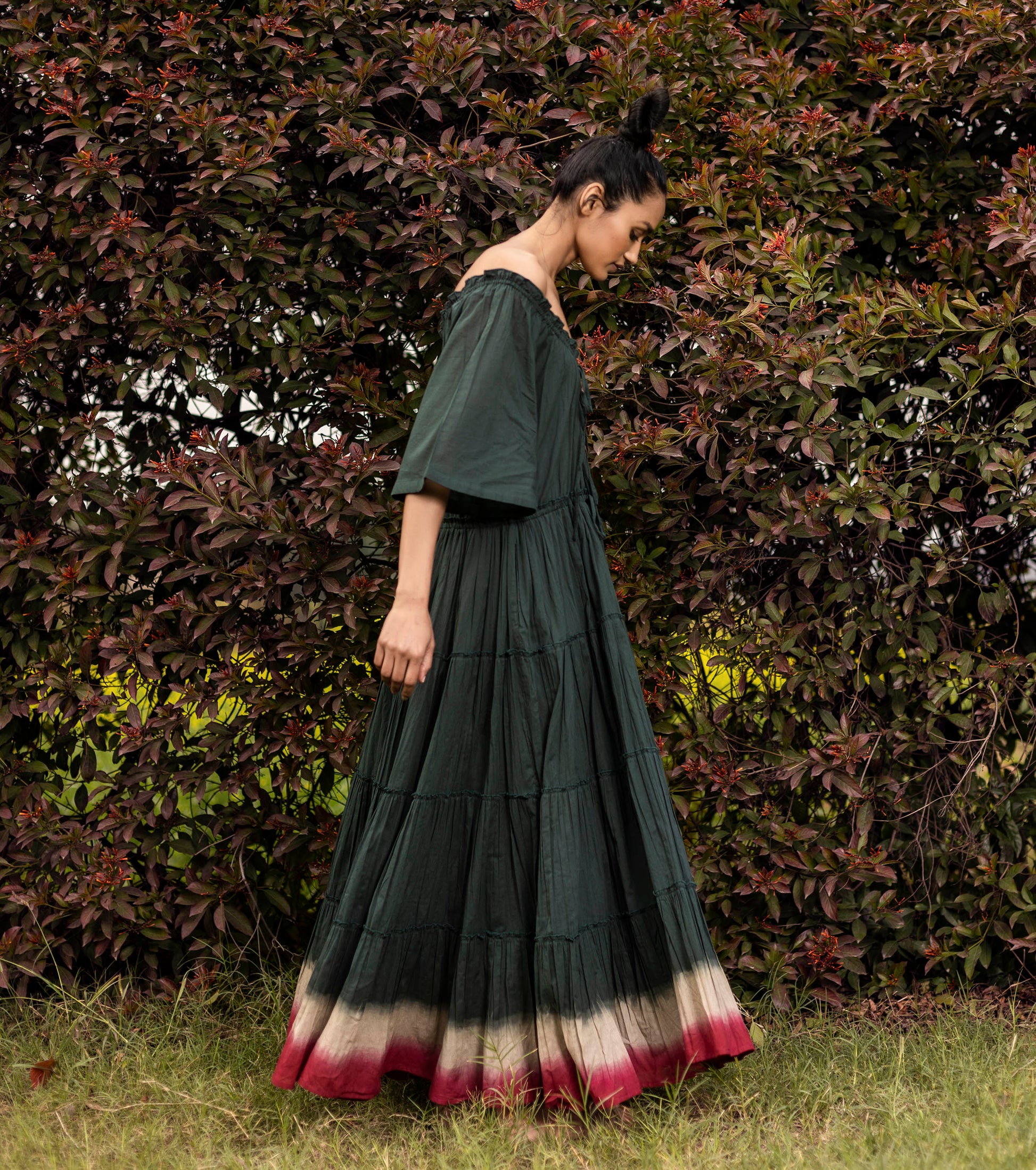 Green Maxi Dress with Pockets at Kamakhyaa by Khara Kapas. This item is Best Selling, Green, Lost & Found, Maxi Dresses, Mulmul, Natural, Off-Shoulder Dresses, Ombre & Dyes, Regular Fit, Resort Wear, Solid Selfmade, Tiered Dresses, Womenswear