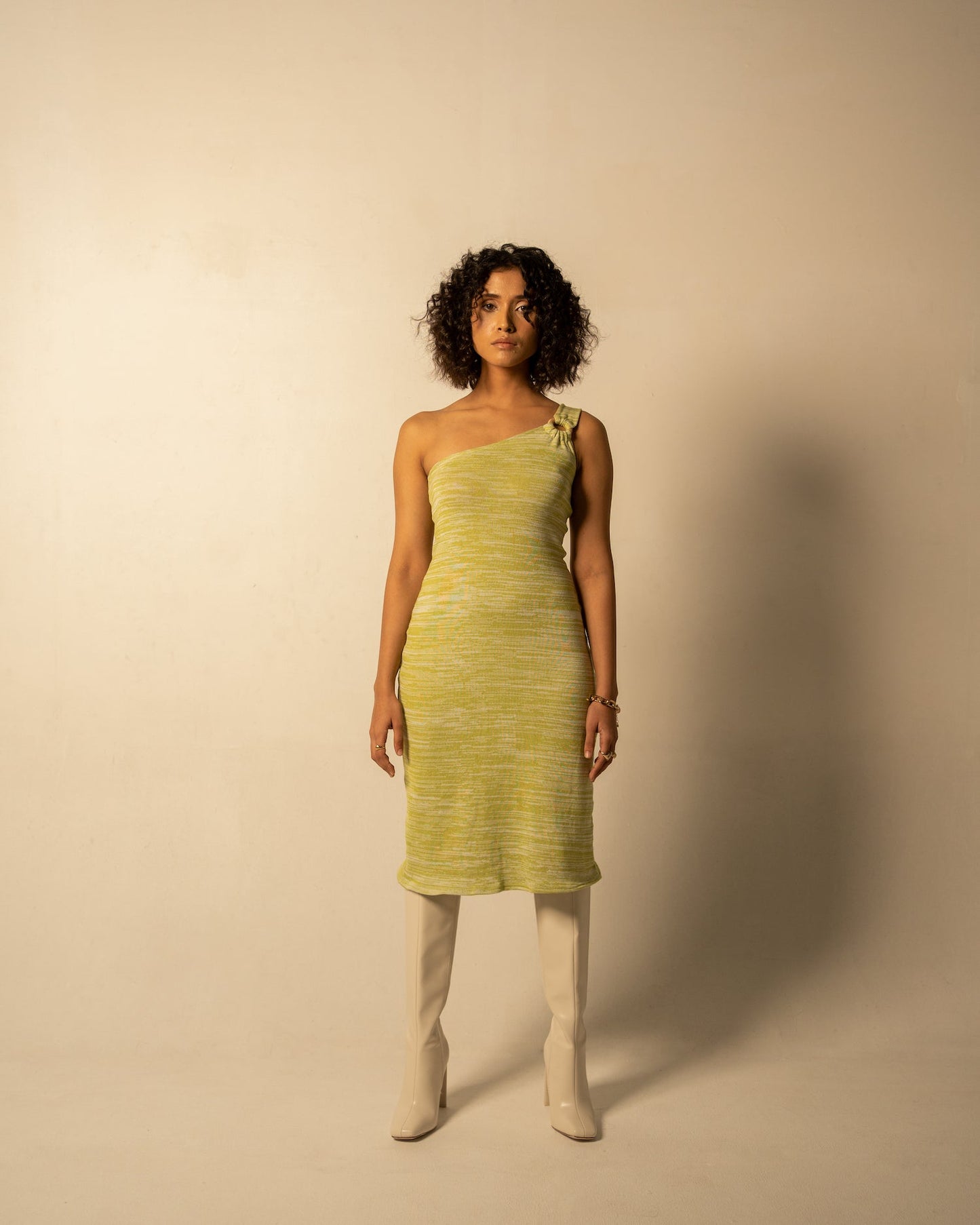 Green Midi Dress at Kamakhyaa by Meko Studio. This item is Cotton, Evening Wear, Green, Hand Knitted, July Sale, July Sale 2023, Midi Dresses, One Shoulder Dresses, Slim Fit, Solid Selfmade, Textured, Tranquil AW-22/23, Womenswear