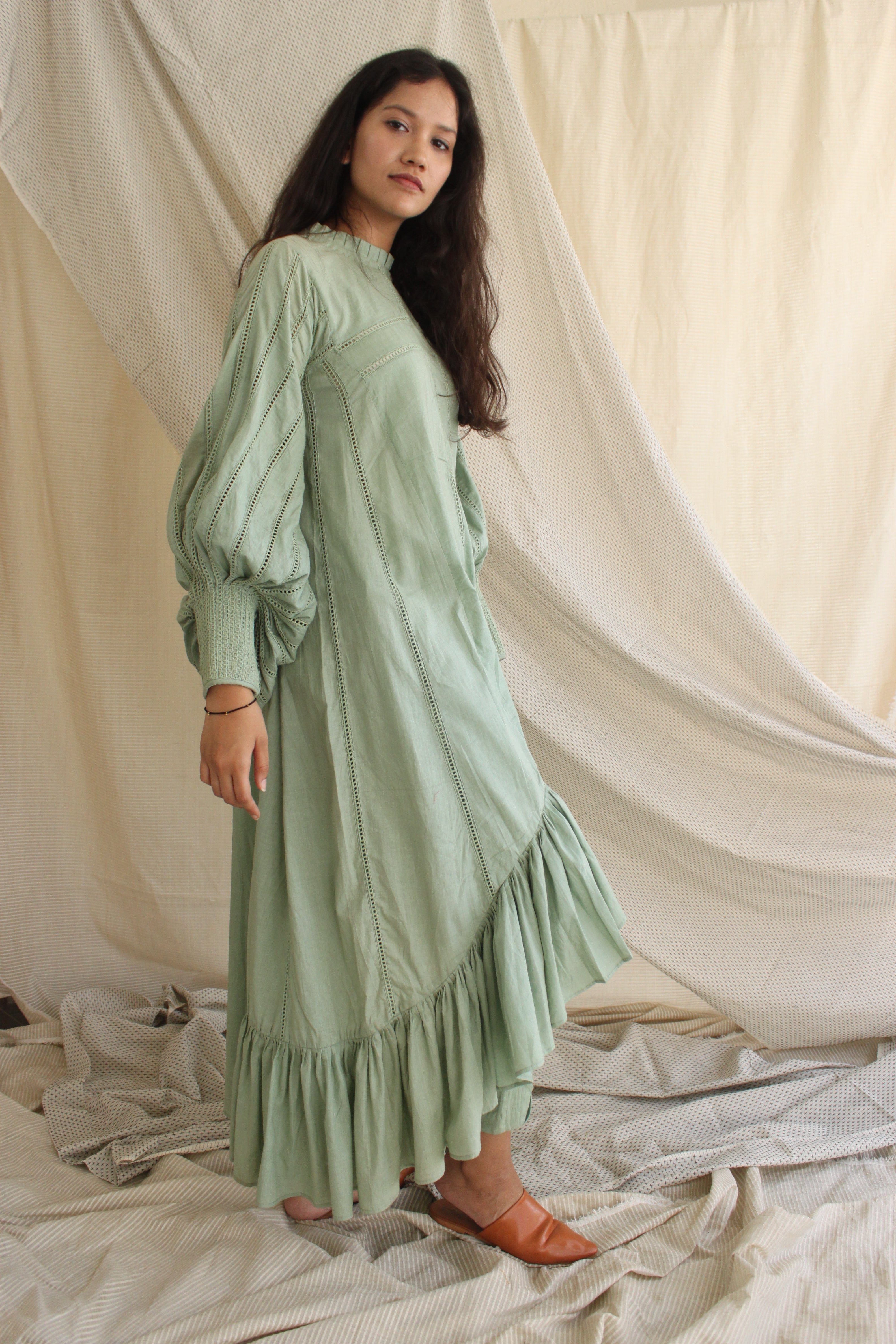 Green Ruffled Full Sleeves Dress at Kamakhyaa by Chambray & Co.. This item is Casual Wear, Cotton, Green, Midi Dresses, Natural, Regular Fit, Ruffle Dresses, Solid Selfmade, Solids, Tiered Dresses, Womenswear
