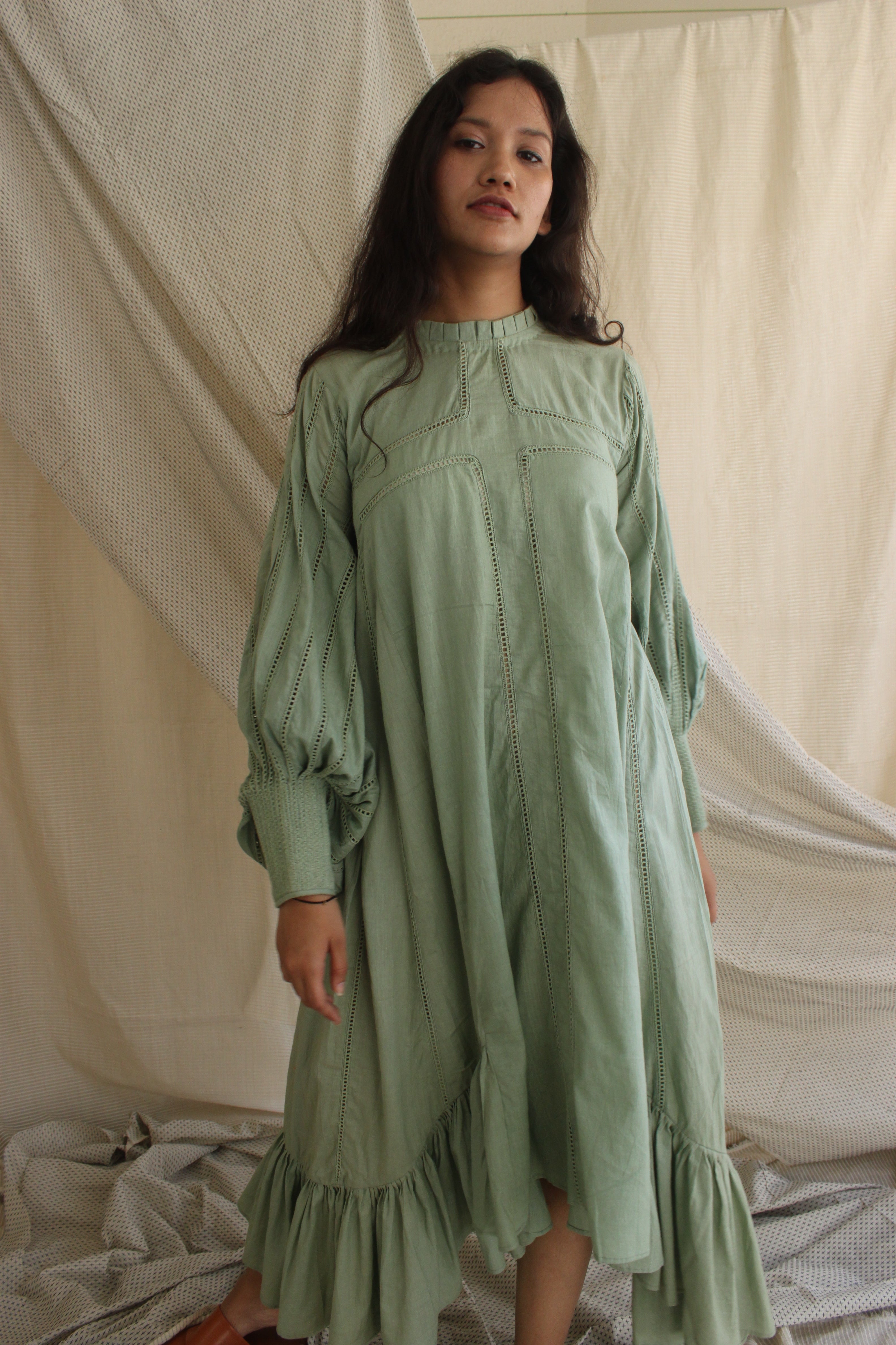Green Ruffled Full Sleeves Dress at Kamakhyaa by Chambray & Co.. This item is Casual Wear, Cotton, Green, Midi Dresses, Natural, Regular Fit, Ruffle Dresses, Solid Selfmade, Solids, Tiered Dresses, Womenswear