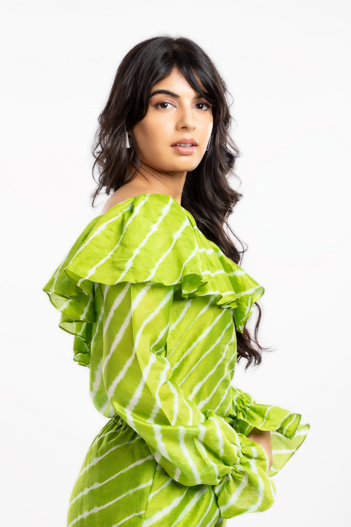 Green Ruffled Tops at Kamakhyaa by House Of Ara. This item is Casual Wear, Chanderi, Green, Leheriya, Leheriya Collection, Natural, Off-shoulder Tops, Regular Fit, Ruffle Tops, Stripes, Womenswear