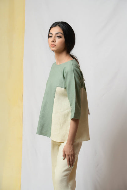 Green Scent Of Earth Tunic Top at Kamakhyaa by Niraa. This item is Blouses, Cotton khadi, Fitted At Bust, Green, Natural with azo dyes, Office Wear, Solids, Tales of rippling brooks, Tops, Womenswear