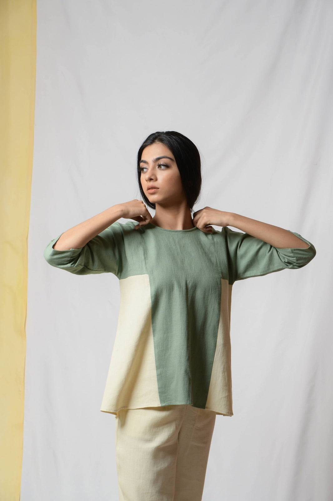 Green Scent Of Earth Tunic Top at Kamakhyaa by Niraa. This item is Blouses, Cotton khadi, Fitted At Bust, Green, Natural with azo dyes, Office Wear, Solids, Tales of rippling brooks, Tops, Womenswear