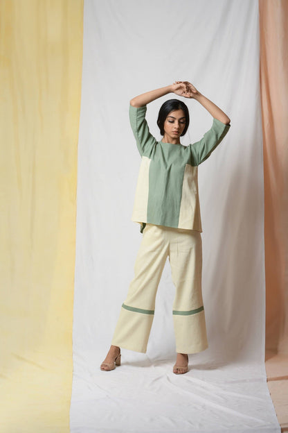 Green Scent Of Earth Tunic Top at Kamakhyaa by Niraa. This item is Blouses, Cotton khadi, Fitted At Bust, Green, Natural with azo dyes, Office Wear, Solids, Tales of rippling brooks, Tops, Womenswear