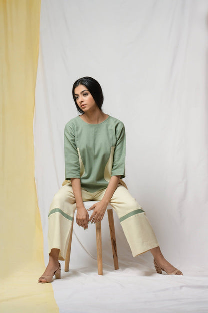 Green Scent Of Earth Tunic Top at Kamakhyaa by Niraa. This item is Blouses, Cotton khadi, Fitted At Bust, Green, Natural with azo dyes, Office Wear, Solids, Tales of rippling brooks, Tops, Womenswear