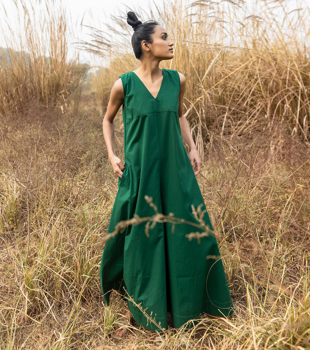 Green Sleeveless Jumpsuit at Kamakhyaa by Khara Kapas. This item is Green, Jumpsuits, Lost & Found, Natural, Poplin, Regular Fit, Resort Wear, Solids, Womenswear