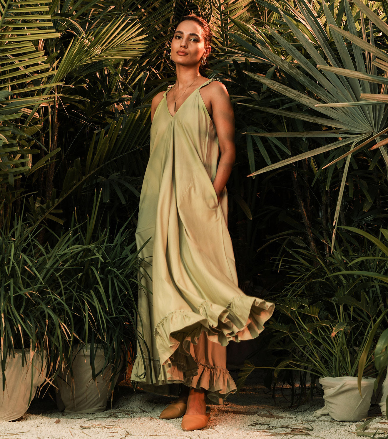 Green Sleeveless Maxi Dress at Kamakhyaa by Khara Kapas. This item is Green, Lost In paradise, Maxi Dresses, Natural, Poplin, Printed Selfsame, Prints, Regular Fit, Resort Wear, Ruffle Dresses, Sleeveless Dresses, Solids, Strap Dresses, Womenswear