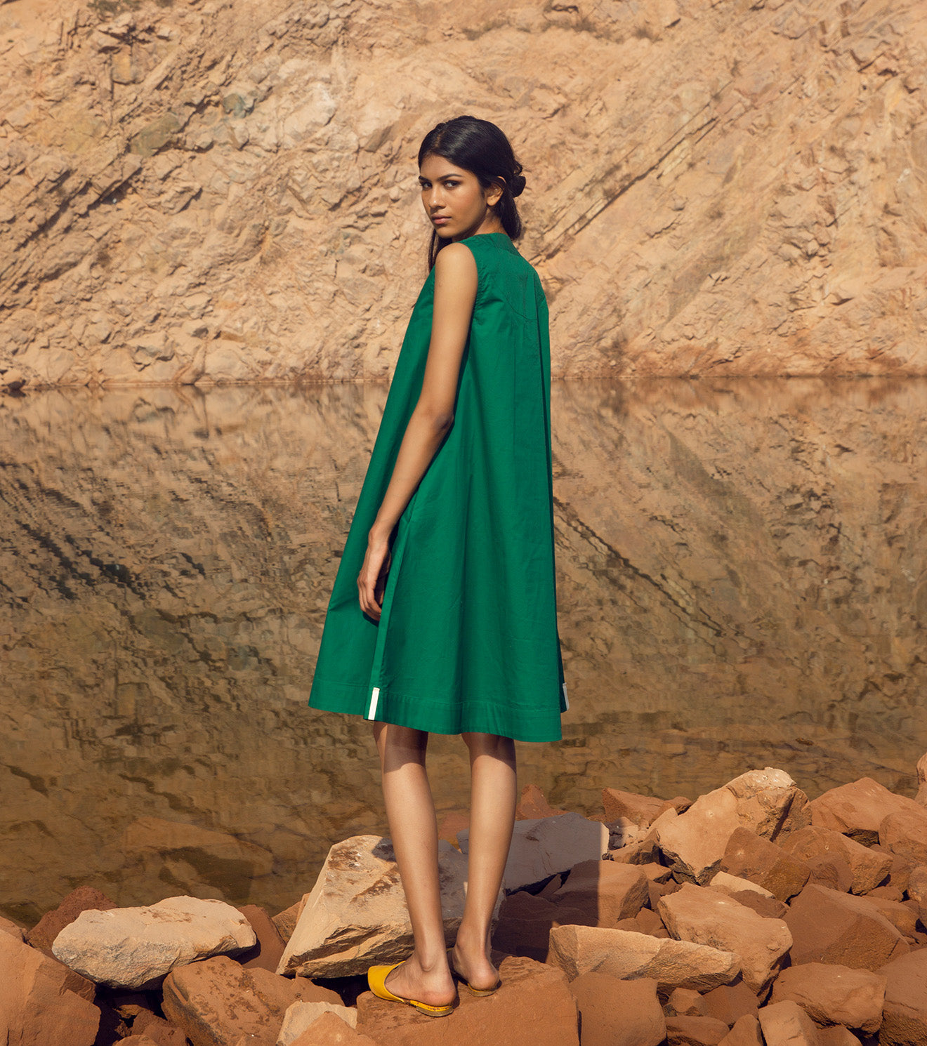 https://kamakhyaa.com/cdn/shop/products/Green-Sleeveless-Mini-Dress-Khara-Kapas-32-Days-9.jpg?v=1709718106&width=1445