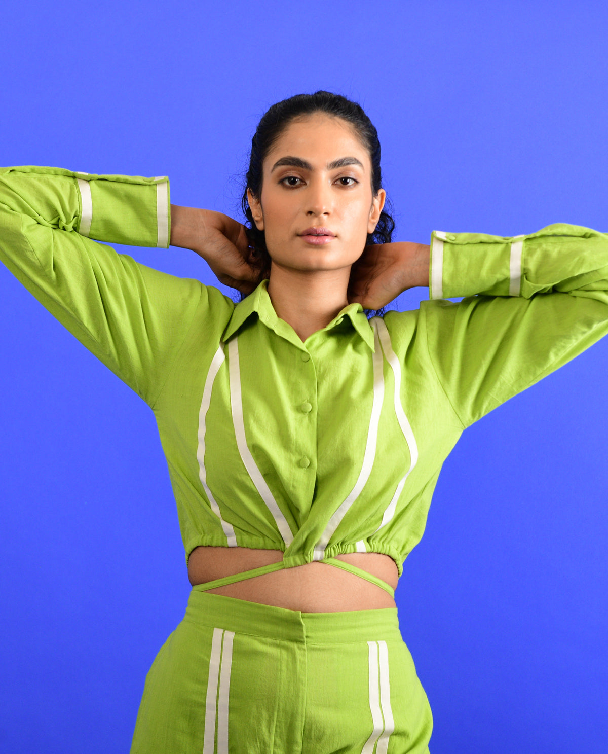 Green Tie Up Crop Top at Kamakhyaa by Rias Jaipur. This item is 100% Organic Cotton, Casual Wear, Crop Tops, Green, Handspun, Handwoven, Hue, Regular Fit, Solids, Stripes, Womenswear