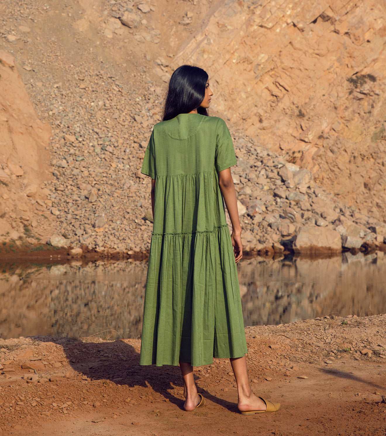 Green Tiered Midi Dress with pockets at Kamakhyaa by Khara Kapas. This item is 32 Days, Cotton Khadi, Green, Midi Dresses, Natural, Relaxed Fit, Resort Wear, Solids, Tiered Dresses, Womenswear