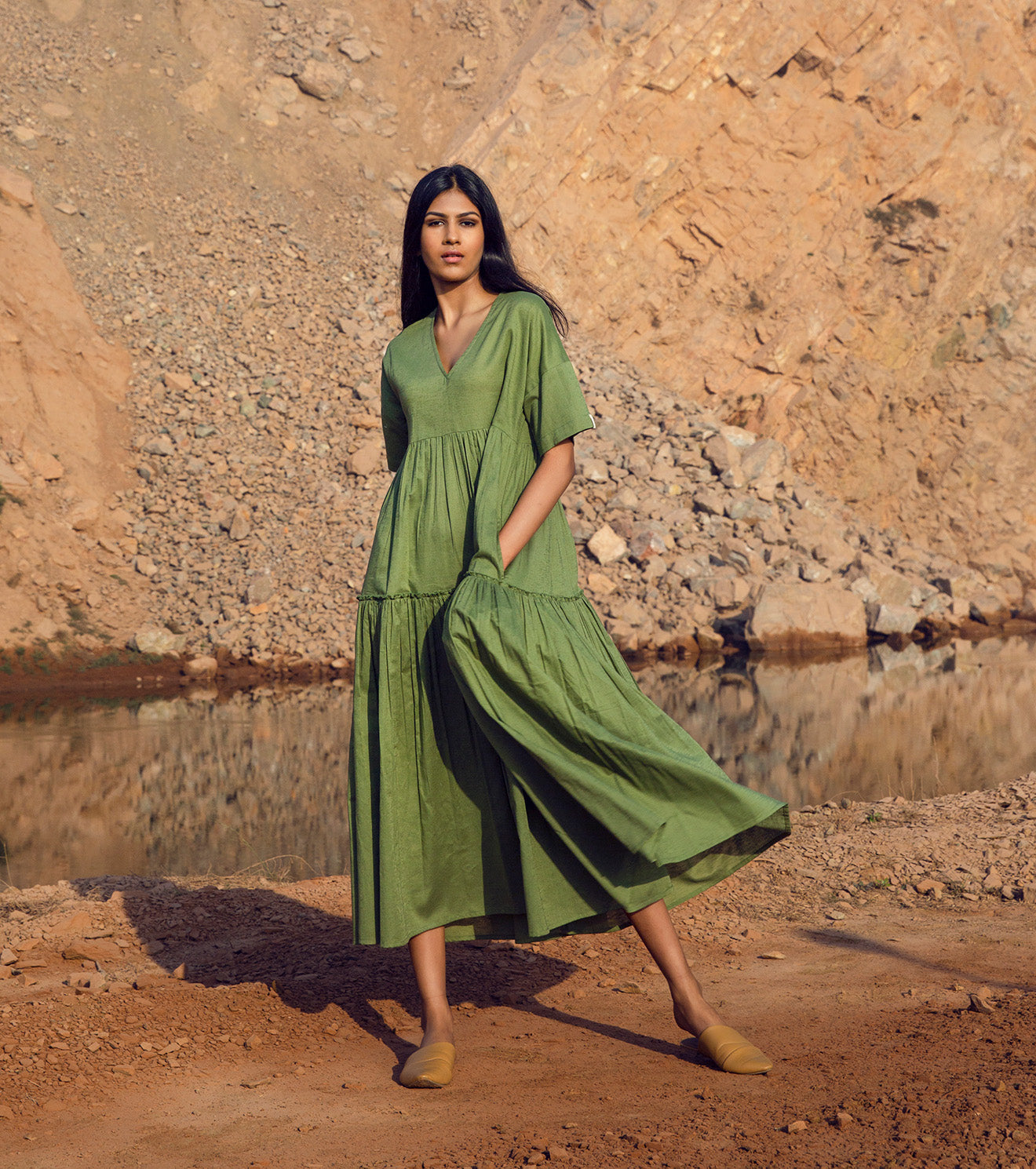 Green Tiered Midi Dress with pockets at Kamakhyaa by Khara Kapas. This item is 32 Days, Cotton Khadi, Green, Midi Dresses, Natural, Relaxed Fit, Resort Wear, Solids, Tiered Dresses, Womenswear