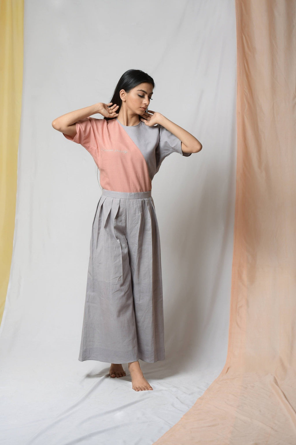 Grey Cotton Khadi Pants at Kamakhyaa by Niraa. This item is Casual Wear, Cotton khadi, Grey, Natural with azo dyes, Palazzo Pants, Relaxed Fit, Solids, Tales of rippling brooks, Womenswear