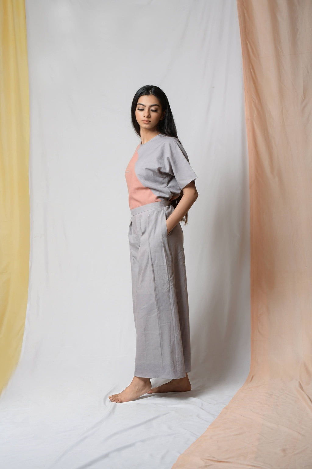 Grey Cotton Khadi Pants at Kamakhyaa by Niraa. This item is Casual Wear, Cotton khadi, Grey, Natural with azo dyes, Palazzo Pants, Relaxed Fit, Solids, Tales of rippling brooks, Womenswear