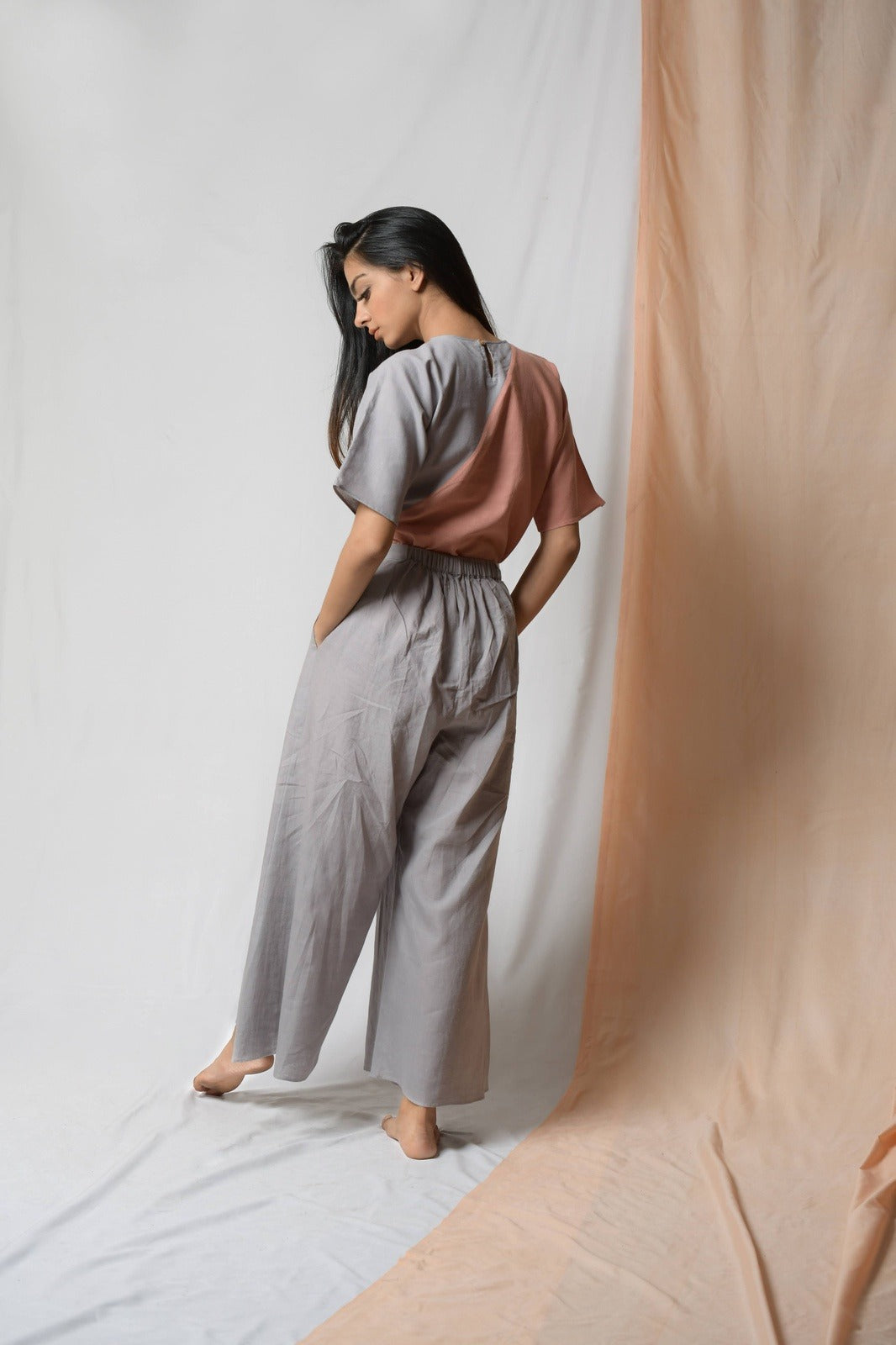 Grey Cotton Khadi Pants at Kamakhyaa by Niraa. This item is Casual Wear, Cotton khadi, Grey, Natural with azo dyes, Palazzo Pants, Relaxed Fit, Solids, Tales of rippling brooks, Womenswear