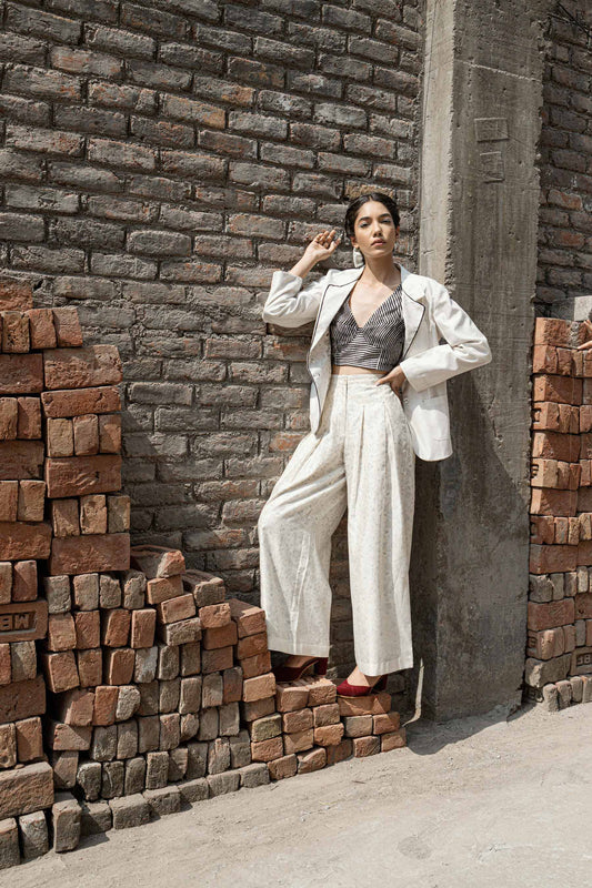 Ivory Chanderi Pleated Pants at Kamakhyaa by Ahmev. This item is Best Selling, Casual Wear, Chanderi, Ink And Ivory, Natural, Palazzo Pants, Prints, Relaxed Fit, White, Womenswear