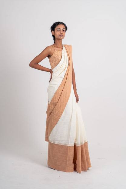 Ivory Cotton Saree at Kamakhyaa by Ahmev. This item is Casual Wear, For Mother, Handloom Cotton, Indian Wear, July Sale, July Sale 2023, Multicolor, Natural, Relaxed Fit, Sarees, Textured, Womenswear