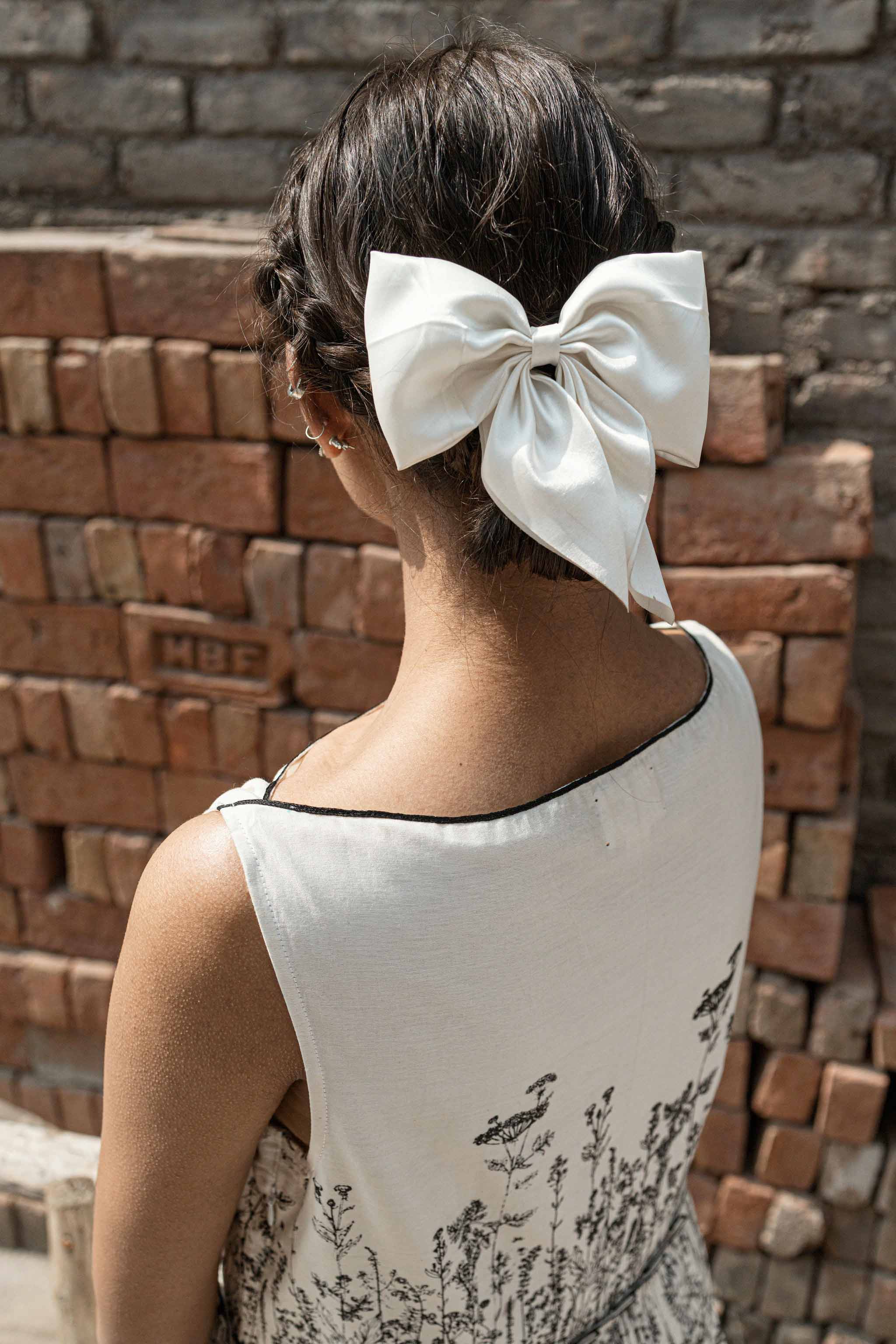 Ivory Knife Pleat Dress at Kamakhyaa by Ahmev. This item is Best Selling, Casual Wear, Chanderi, FB ADS JUNE, Ink And Ivory, Midi Dresses, Natural, Prints, Regular Fit, Sleeveless Dresses, White, Womenswear