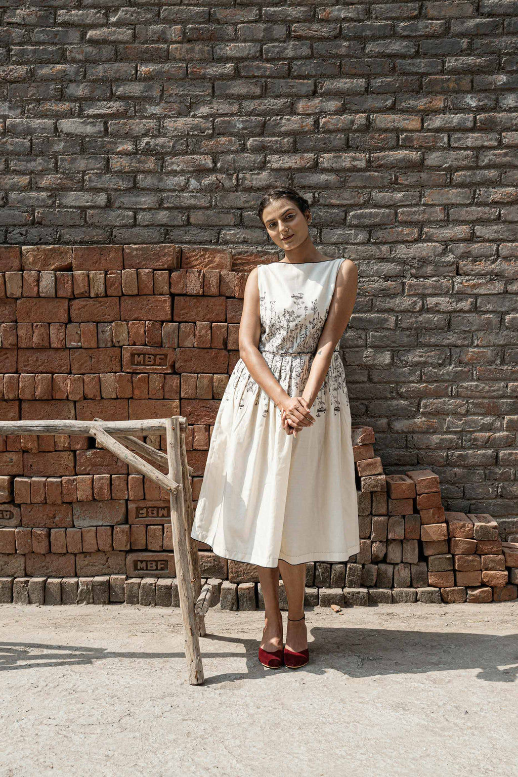 Ivory Knife Pleat Dress at Kamakhyaa by Ahmev. This item is Best Selling, Casual Wear, Chanderi, FB ADS JUNE, Ink And Ivory, Midi Dresses, Natural, Prints, Regular Fit, Sleeveless Dresses, White, Womenswear