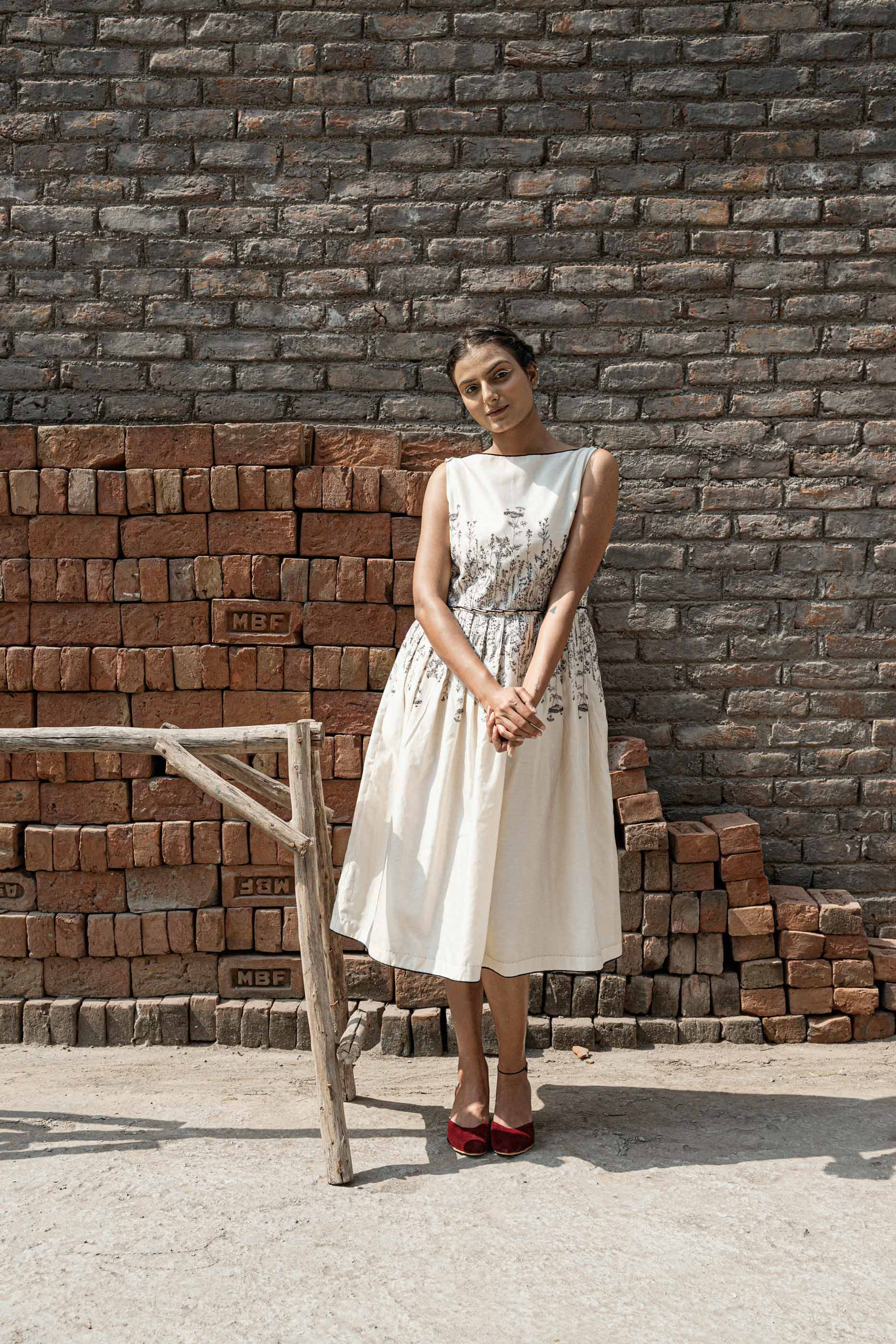 Ivory Knife Pleat Dress at Kamakhyaa by Ahmev. This item is Best Selling, Casual Wear, Chanderi, FB ADS JUNE, Ink And Ivory, Midi Dresses, Natural, Prints, Regular Fit, Sleeveless Dresses, White, Womenswear