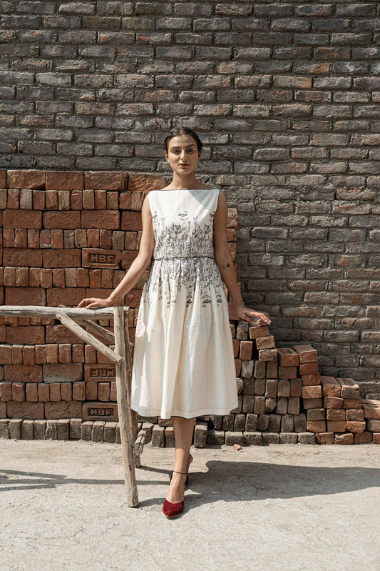 Ivory Knife Pleat Dress at Kamakhyaa by Ahmev. This item is Best Selling, Casual Wear, Chanderi, FB ADS JUNE, Ink And Ivory, Midi Dresses, Natural, Prints, Regular Fit, Sleeveless Dresses, White, Womenswear