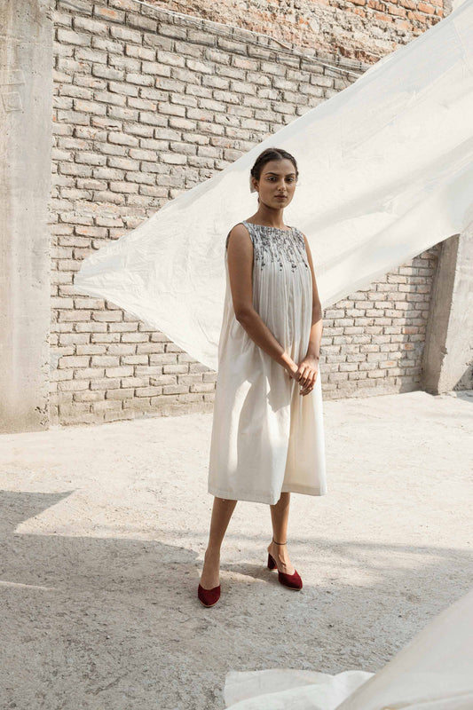Ivory Pleated Neck Dress at Kamakhyaa by Ahmev. This item is Casual Wear, Chanderi, Ink And Ivory, Midi Dresses, Natural, Prints, Regular Fit, Sleeveless Dresses, White, Womenswear