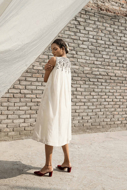 Ivory Pleated Neck Dress at Kamakhyaa by Ahmev. This item is Casual Wear, Chanderi, Ink And Ivory, Midi Dresses, Natural, Prints, Regular Fit, Sleeveless Dresses, White, Womenswear