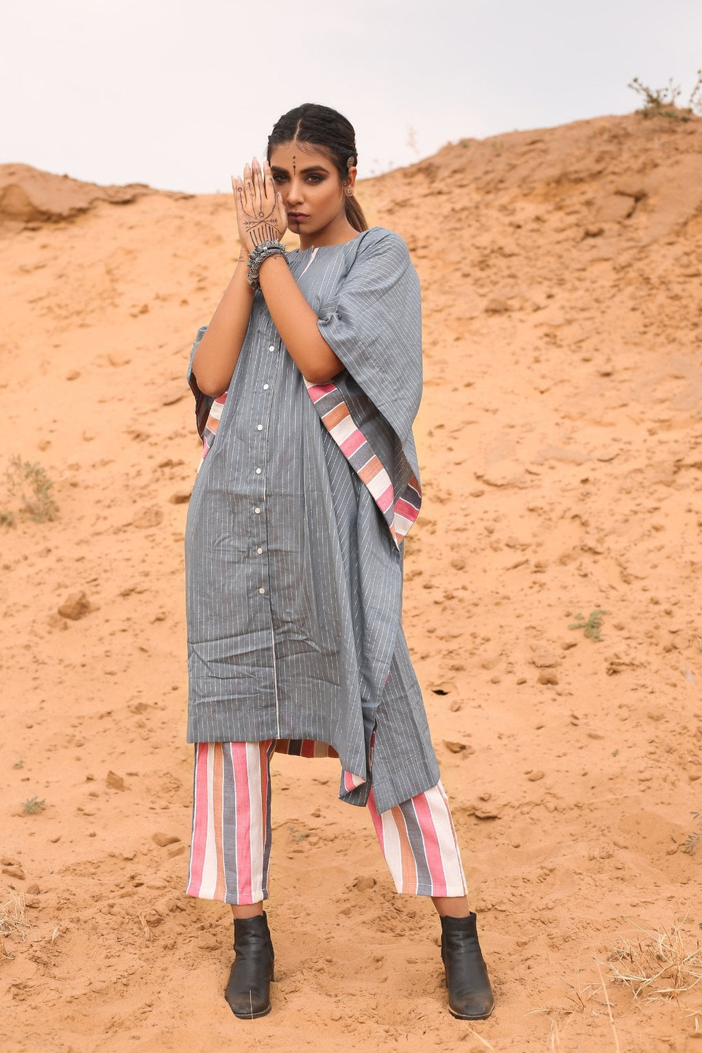 Kaftan With Multicolored Striped Pants - Set Of Two at Kamakhyaa by Keva. This item is Co-ord Sets, Cotton, Cotton Lurex, Desert Rose, Grey, Natural, Relaxed Fit, Resort Wear, Stripes, Travel, Travel Co-ords, Womenswear