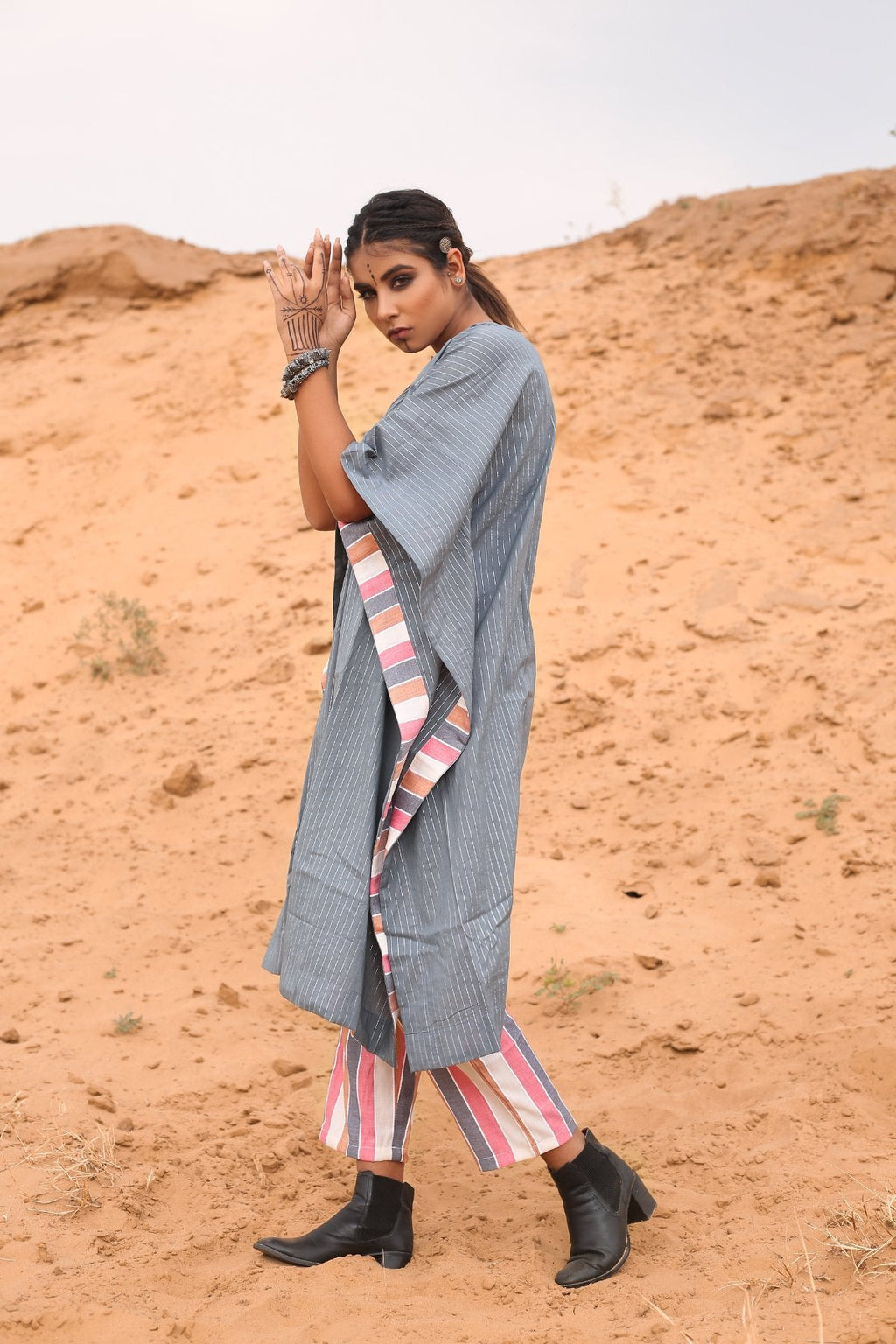 Kaftan With Multicolored Striped Pants - Set Of Two at Kamakhyaa by Keva. This item is Co-ord Sets, Cotton, Cotton Lurex, Desert Rose, Grey, Natural, Relaxed Fit, Resort Wear, Stripes, Travel, Travel Co-ords, Womenswear