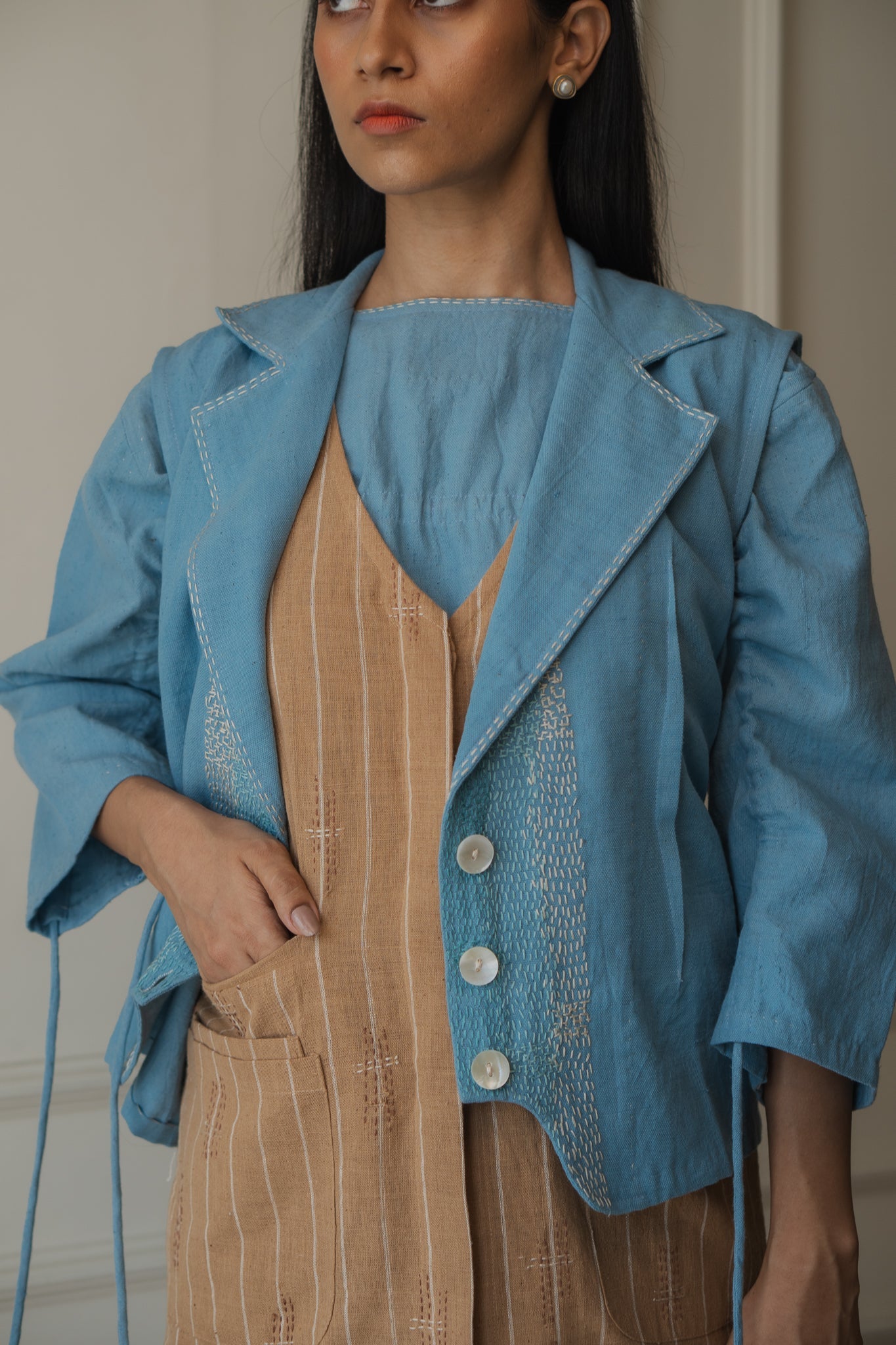 Light Blue Sleeveless Cropped Jacket at Kamakhyaa by Lafaani. This item is 100% pure cotton, Casual Wear, Jackets, Light Blue, Materiality, Natural with azo free dyes, Organic, Regular Fit, Solids, Womenswear