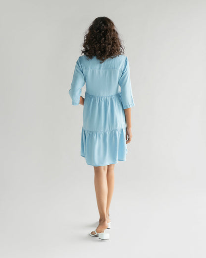 Light Blue Tiered Dress at Kamakhyaa by Reistor. This item is Blue, Casual Wear, Denim, FB ADS JUNE, Mini Dresses, Natural, Solids, Tencel, Tiered Dresses, Womenswear