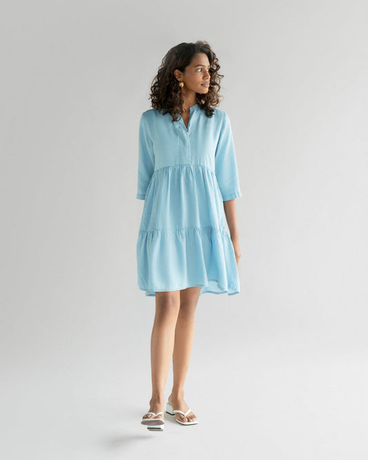 Light Blue Tiered Dress at Kamakhyaa by Reistor. This item is Blue, Casual Wear, Denim, FB ADS JUNE, Mini Dresses, Natural, Solids, Tencel, Tiered Dresses, Womenswear