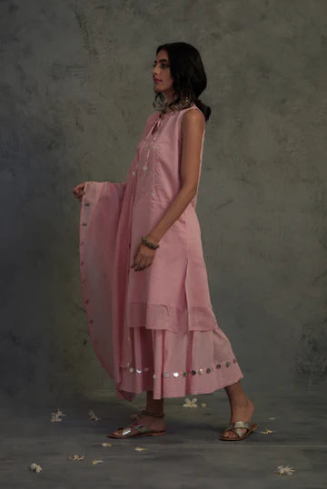 Light Pink Sleeveless Kurta at Kamakhyaa by Charkhee. This item is Chanderi, Cotton, Embellished, Ethnic Wear, Indian Wear, Kurta Palazzo Sets, Kurta Set With Dupatta, Mirror Work, Natural, Pink, Relaxed Fit, Tyohaar, Womenswear