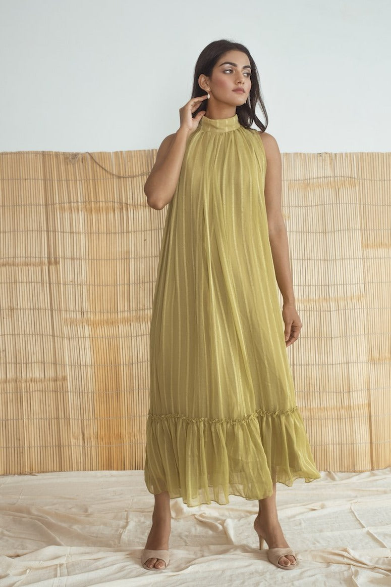 Lime Green Dress at Kamakhyaa by Taro. This item is Best Selling, Cotton, Evening Wear, FB ADS JUNE, Green, Halter Neck Dresses, Handloom Blend, Indo-Western, July Sale, July Sale 2023, Midi Dresses, Natural, Relaxed Fit, Rozana Taro, Solid Selfmade, Textured, Womenswear