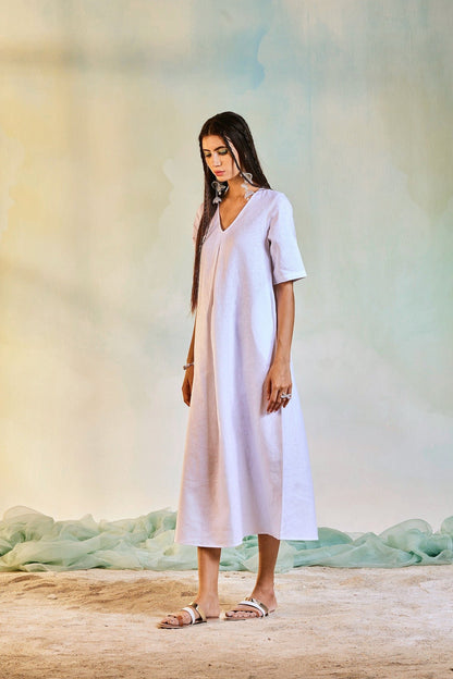 Linen Centre Pleat Dress at Kamakhyaa by Charkhee. This item is Best Selling, Casual Wear, Linen, Midi Dresses, Natural, Regular Fit, Textured, White, Womenswear