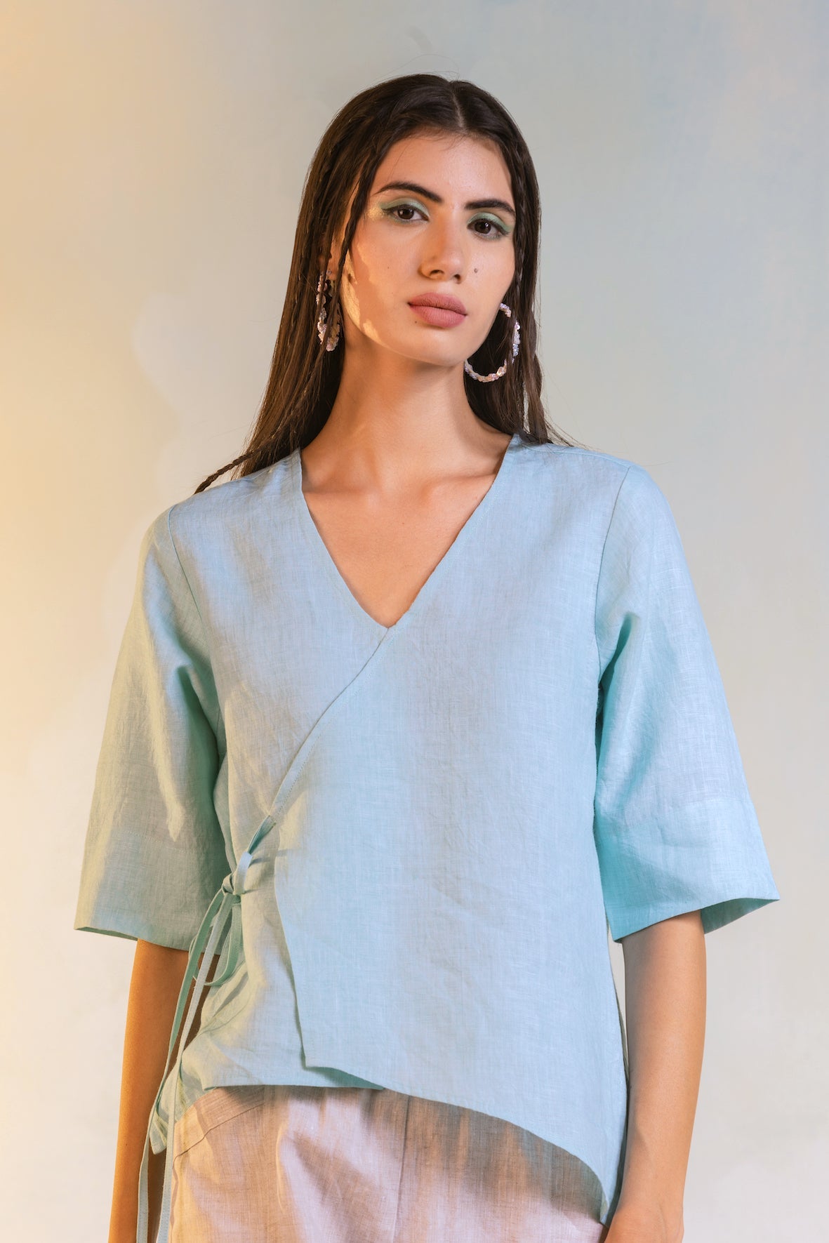 Linen Tie-Up Top at Kamakhyaa by Charkhee. This item is Blue, Casual Wear, Linen, Natural, Regular Fit, Textured, Tops, Womenswear, Wrap Tops