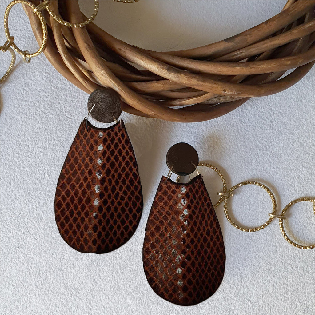 Maroon Short Earrings- Lueur at Kamakhyaa by Noupelle. This item is Casual Wear, Fashion Jewellery, Free Size, jewelry, Less than $50, Natural, Products less than $25, Red, Short Earrings, Upcycled, Upcycled leather