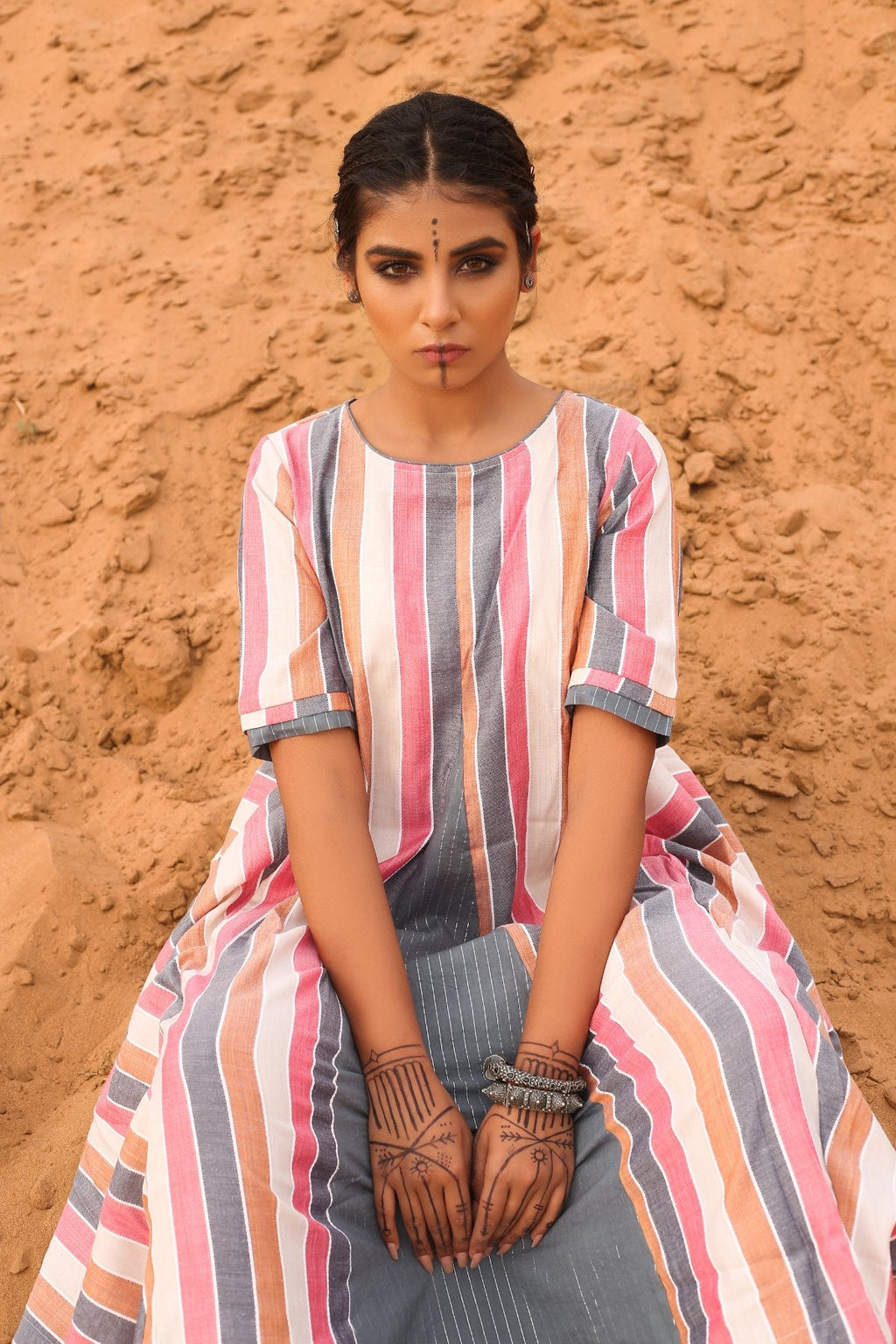 Multi-Colored Cowl Dress at Kamakhyaa by Keva. This item is Cotton, Desert Rose, Midi Dresses, Multicolor, Natural, Relaxed Fit, Resort Wear, Stripes, Womenswear