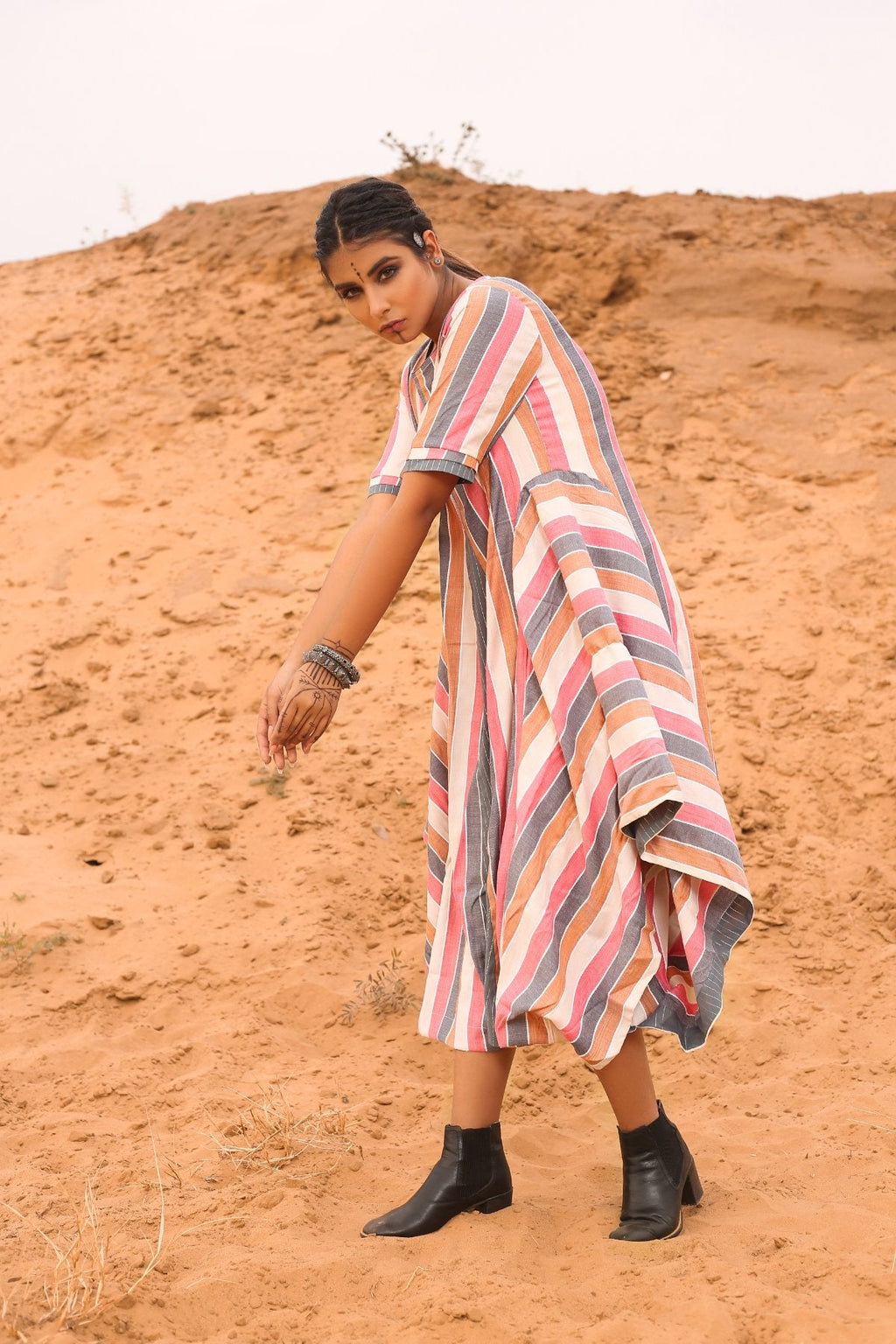 Multi-Colored Cowl Dress at Kamakhyaa by Keva. This item is Cotton, Desert Rose, Midi Dresses, Multicolor, Natural, Relaxed Fit, Resort Wear, Stripes, Womenswear