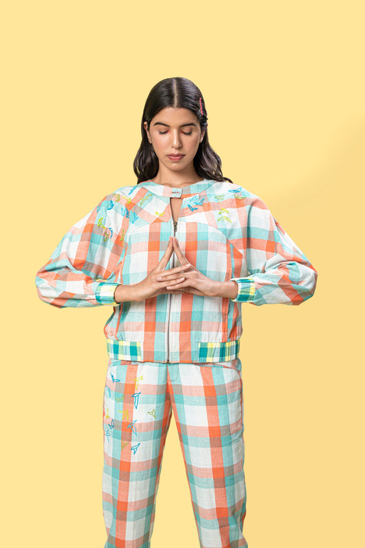 Multicolor Bomber jacket at Kamakhyaa by Anushé Pirani. This item is Checks, Easter, Handwoven Cotton, Jackets, July Sale, July Sale 2023, Multicolor, Natural, Of Myriad Minds, Office Wear, Playful Office Wear, Relaxed Fit, sale anushe pirani, Womenswear