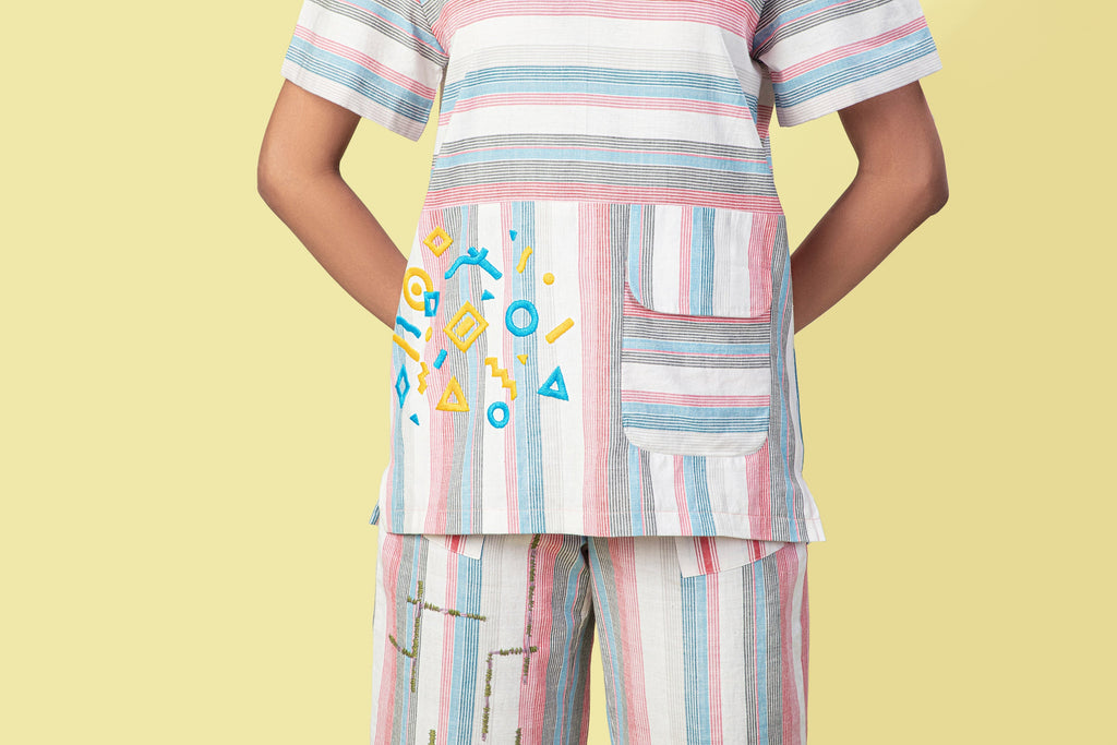 Multicolor Custom T-shirt at Kamakhyaa by Anushé Pirani. This item is Fitted At Waist, Handwoven Cotton, July Sale, July Sale 2023, Multicolor, Natural, Of Myriad Minds, Office Wear, Playful Office Wear, sale anushe pirani, Stripes, T-Shirts, Tops, Womenswear