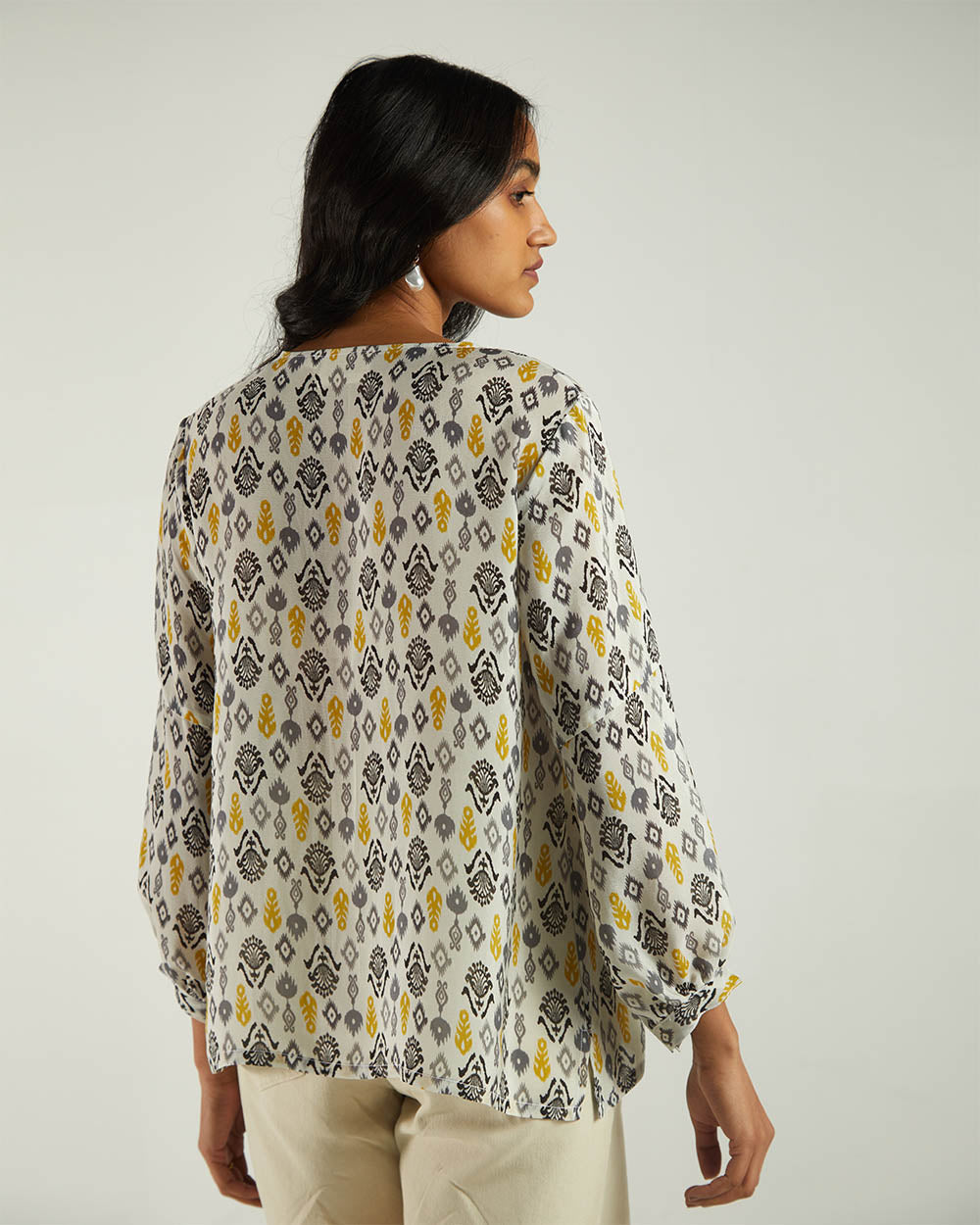 Multicolor Ikat top at Kamakhyaa by Reistor. This item is Bemberg, Casual Wear, Natural, Prints, Regular Fit, Tops, Tunic Tops, White, Womenswear