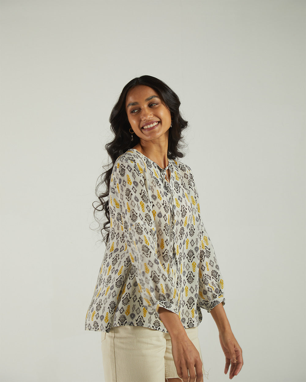 Multicolor Ikat top at Kamakhyaa by Reistor. This item is Bemberg, Casual Wear, Natural, Prints, Regular Fit, Tops, Tunic Tops, White, Womenswear