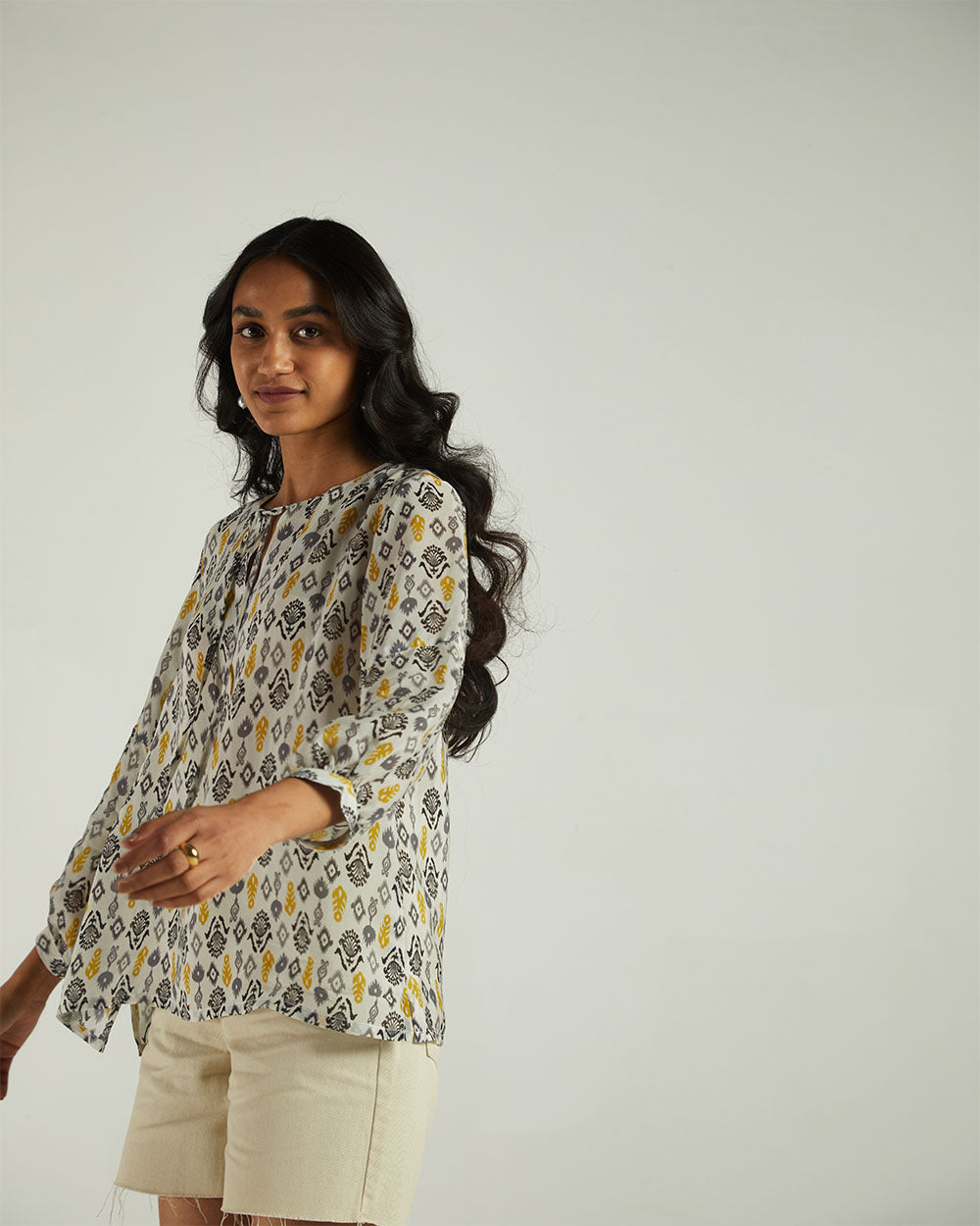 Multicolor Ikat top at Kamakhyaa by Reistor. This item is Bemberg, Casual Wear, Natural, Prints, Regular Fit, Tops, Tunic Tops, White, Womenswear