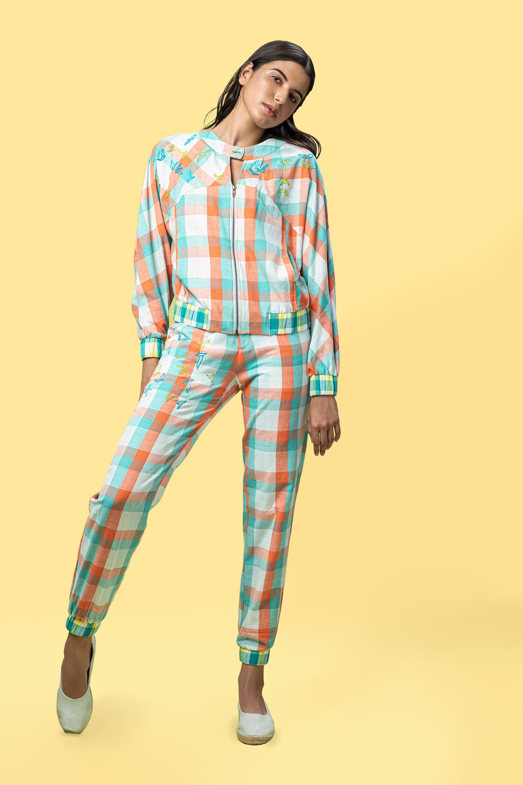 Multicolor Jogger Pants at Kamakhyaa by Anushé Pirani. This item is Casual Wear, Checks, Fitted At Waist, Handwoven Cotton, Joggers, July Sale, July Sale 2023, Multicolor, Natural, Of Myriad Minds, Office Wear, Playful Office Wear, sale anushe pirani, Womenswear