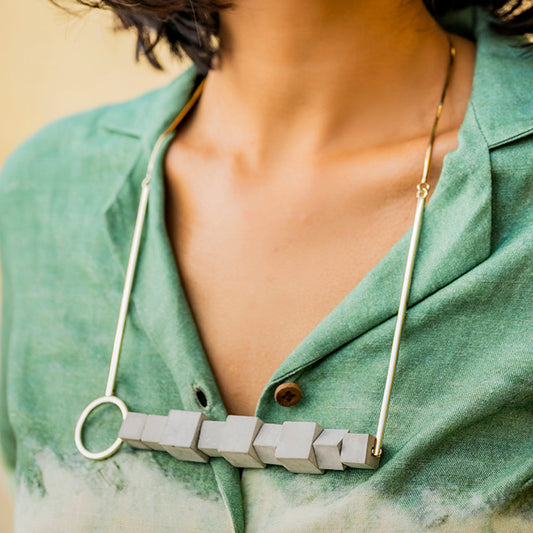 Necklaces 90 degree at Kamakhyaa by Edenek. This item is Brass, Concrete, Fashion Jewellery, Free Size, Grey, jewelry, Natural, Necklaces, Party Wear, Pendant Chain, Solids, Statement Jewellery