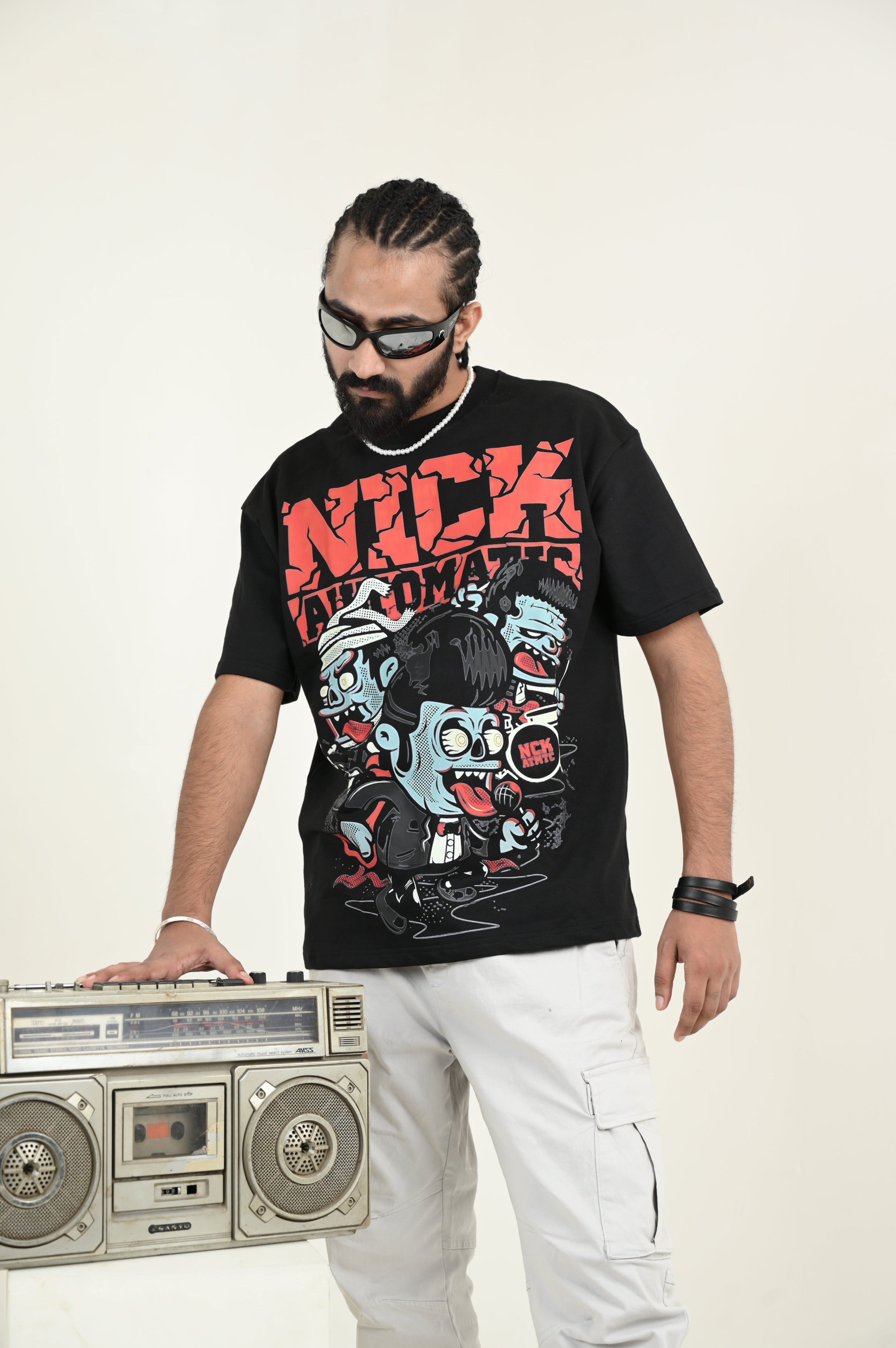 Nick Automatic 100% Cotton Oversized Black T-shirt at Kamakhyaa by Unfussy. This item is 100% cotton, Black, Casual Wear, Organic, Oversized Fit, Printed, T-Shirts, Unfussy, Unisex, Womenswear