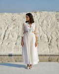 Oceanic Coconut Dress at Kamakhyaa by The Loom Art. This item is Aurora SS24, Best Selling, Casual Wear, Chanderi Silk, Cut Out Dresses, Embroidered, FB ADS JUNE, July Sale, July Sale 2023, Maxi Dresses, Ombre & Dyes, Organic, Regular Fit, White, Womenswear
