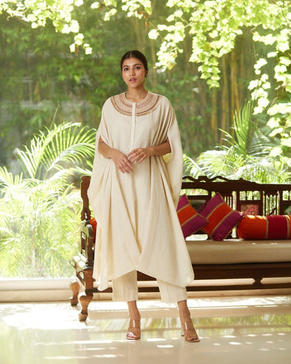 Off White Khadi Cotton Kurta Pant Set at Kamakhyaa by Mayura Kumar. This item is Casual Wear, Festive Wear, Kurta Pant Sets, Mayura Kumar, Off white, Regular Fit, Satin, Silk, Solids, Timeless Elegance, Womenswear