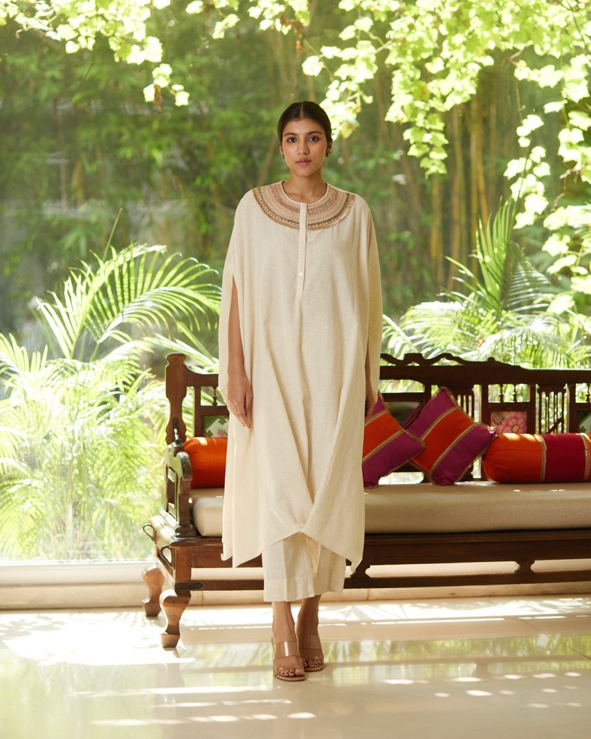 Off White Khadi Cotton Kurta Pant Set at Kamakhyaa by Mayura Kumar. This item is Casual Wear, Festive Wear, Kurta Pant Sets, Mayura Kumar, Off white, Regular Fit, Satin, Silk, Solids, Timeless Elegance, Womenswear