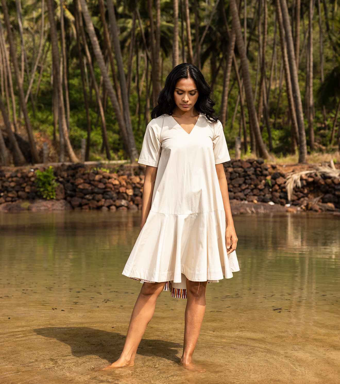 Off White Mini Dress at Kamakhyaa by Khara Kapas. This item is Cotton, Mini Dresses, Natural, Oh Carol, Regular Fit, Resort Wear, Solids, Tiered Dresses, White, Womenswear